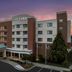 Courtyard by Marriott Greensboro Airport exterior at dusk in Greensboro with covered entrance