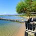 Grand Hôtel De Cala Rossa in Porto-Vecchio with private dock, clear bay water and sandy shore