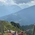 Haus Friedrichsburg in Bad Hofgastein with a hammock overlooking alpine mountains and green hills