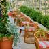 The Hollywood Grande, Autograph Collection terrace with wicker seating and Hollywood sign view in Los Angeles
