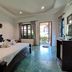 Lanta White Rock, Ko Lanta: guest room with king bed, tiled floor and patio door to garden