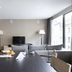 Allegroitalia San Pietro All'Orto 6 Milan living area with sofa, dining table and large windows
