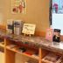 Toyoko Inn Iwaki Ekimae lobby counter with brochures, phone, and guest service items in Iwaki