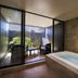 Houraiya in Kamogawa: private indoor bath with soaking tub and sliding glass doors to a small patio