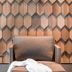 Quality Hotel The Box in Linköping lobby seating area with geometric wood wall and side table