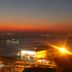 Bella Hotel in Istanbul with waterfront night views, glowing lights, and boats on the water