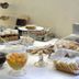 Hotel 4 Stagioni Sensus Spa in Bardolino breakfast buffet with pastries, fruit, bread, and covered trays