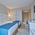 Hotel Best Sol D´Or in Salou guest room with twin beds, blue bed runners, desk and chair