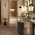 Jumeirah Dar Al Masyaf Dubai bathroom with freestanding tub, vanity, and doorway to bedroom