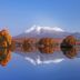 Hakodate-Onuma Prince Hotel in Nanae with a snowy mountain reflected in a calm lake