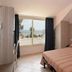 Hotel Concorde Cesenatico guest room with bed, wardrobe, and balcony sea view