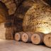 Posada Mayor de Migueloa in Laguardia, vaulted stone wine cellar with wooden barrels