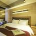 Daegu Innovalley hotel room in Daegu with glass-enclosed bedroom and king bed