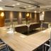 Flair Hotel Nieder in Bestwig boardroom with long conference table and high-back chairs