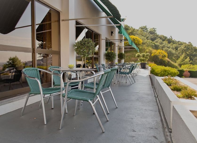 Hotel D. Luis in Coimbra with terrace seating and hillside views