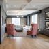 Derby City Gaming & Hotel in Louisville with a spacious suite seating area and two patterned chairs