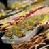 Hotel Aubi in Palamós buffet table with assorted appetizers, sandwiches, and dessert cups