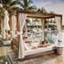 TRS Coral Hotel - Adults Only in Cancún: beachfront cabana beside a serene pool with palm trees