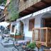 Pension Leopoldine in Hallstatt with a small balcony, outdoor seating, and lakeside-style terrace