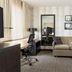 Residence Inn by Marriott Dayton Vandalia suite with sofa, desk, chair and wall art in Dayton