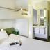 Ibis Budget Dresden Kesselsdorf room with bunk bed over double bed and compact sink area, Kesselsdorf