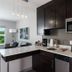 Residence Inn by Marriott Knoxville Downtown kitchenette with stainless steel appliances and white countertop