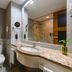 Pestana São Paulo bathroom with marble vanity, toilet, bidet, and glass shower in Sao Paulo
