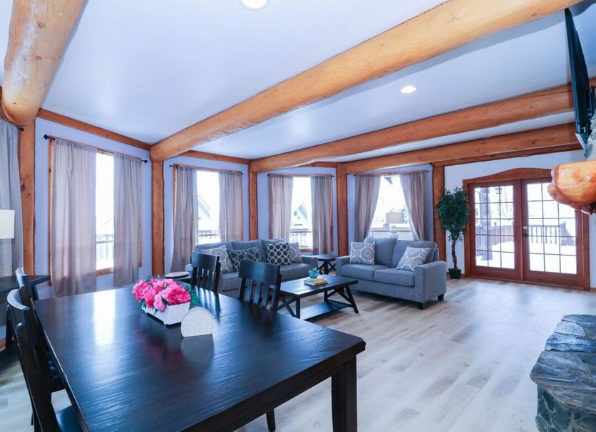 The Castle at Swan Lake in Vernon: bright suite with lake-view windows and seating area