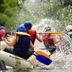 Guests whitewater rafting near North Creek Lodge at Gore Mountain, North Creek