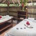 El Refugio Hotel & Spa in Sasaima: rustic spa treatment room with two massage tables