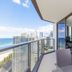 Rhapsody Resort Surfers Paradise balcony with ocean and skyline views from a high-rise apartment