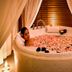 The Heritage Grand Khon Kaen Hotel and Convention spa bath with flower petals and candles in Khon Kaen