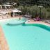 Pool terrace at Albergo Ristorante San Matteo in San Bartolomeo al Mare with hillside views