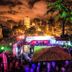 Nighttime rooftop party at Casa Blanca Hotel in Windhoek with colorful lights and palm trees