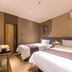 Home Inn Neo Lanzhou City Museum Dongfanghong Plaza Wanxiang City in Lanzhou, twin beds in a simple guest room