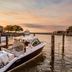 The Grand Hotel Golf Resort & Spa, Autograph Collection in Point Clear with boat dock at sunset