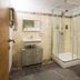 Penzion Kovac in Radovljica bathroom with walk-in shower, sink vanity and toilet