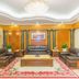 Zuiranju Holiday Hotel in Zhaoqing lobby lounge with sofas, coffee table and chandelier