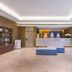 Home Inn Neo Changzhou Wanda Plaza Tongjiang Avenue lobby with reception desk and seating, Changzhou