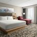 Hilton Garden Inn Richmond South/Southpark guest room with king bed, chaise lounge, and window curtains in Colonial Heights