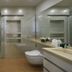 The Clouds Apartment, Shenzhen bathroom with soaking tub, glass shower, wall-mounted toilet and vanity