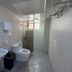 Philstay Ehwa Boutique - Female Only bathroom with sink, toilet, shower and towel rack in Seoul