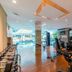 Centara Pattaya Hotel fitness room beside indoor pool in Pattaya