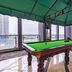Chongqing Yueyou Hotel North New District Qibo Hotel rooftop terrace with billiards table and city view