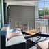 Garner Hotel Oberhausen By IHG lounge with seating area and large window overlooking Oberhausen