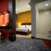Orkid Inn Mahkota Cheras Kuala Lumpur room with bed and glass shower bathroom