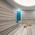 Crowne Plaza Istanbul - West by IHG spa room with striped marble walls and blue mosaic accents