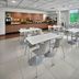 City Express by Marriott Lazaro Cardenas breakfast area with tables, stools and buffet counter