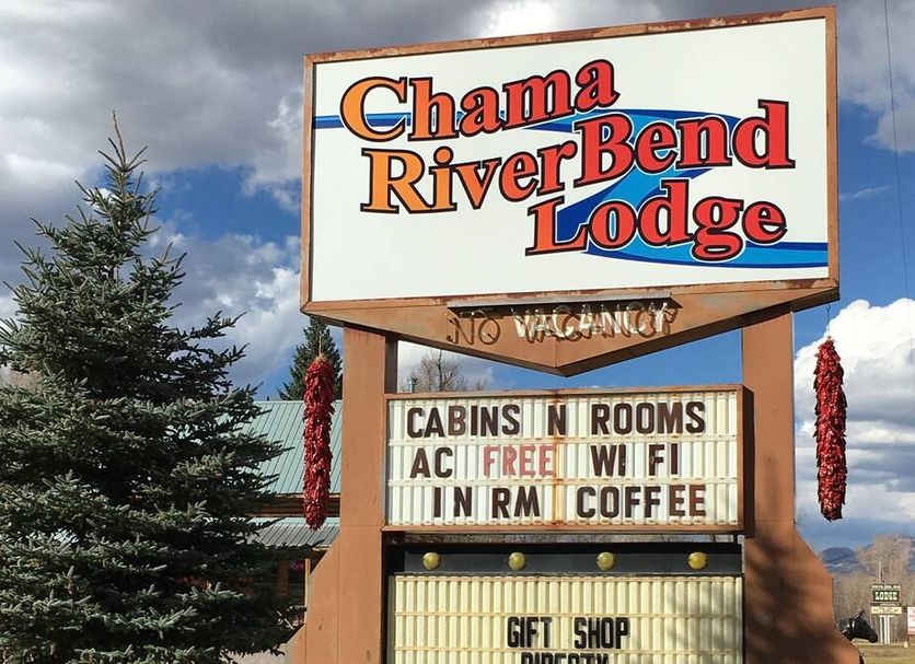 Chama River Bend Lodge sign in Chama with cabins, rooms, WiFi, AC and free coffee
