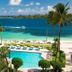 British Colonial Nassau in Nassau with a beachfront pool, palm trees and turquoise ocean view